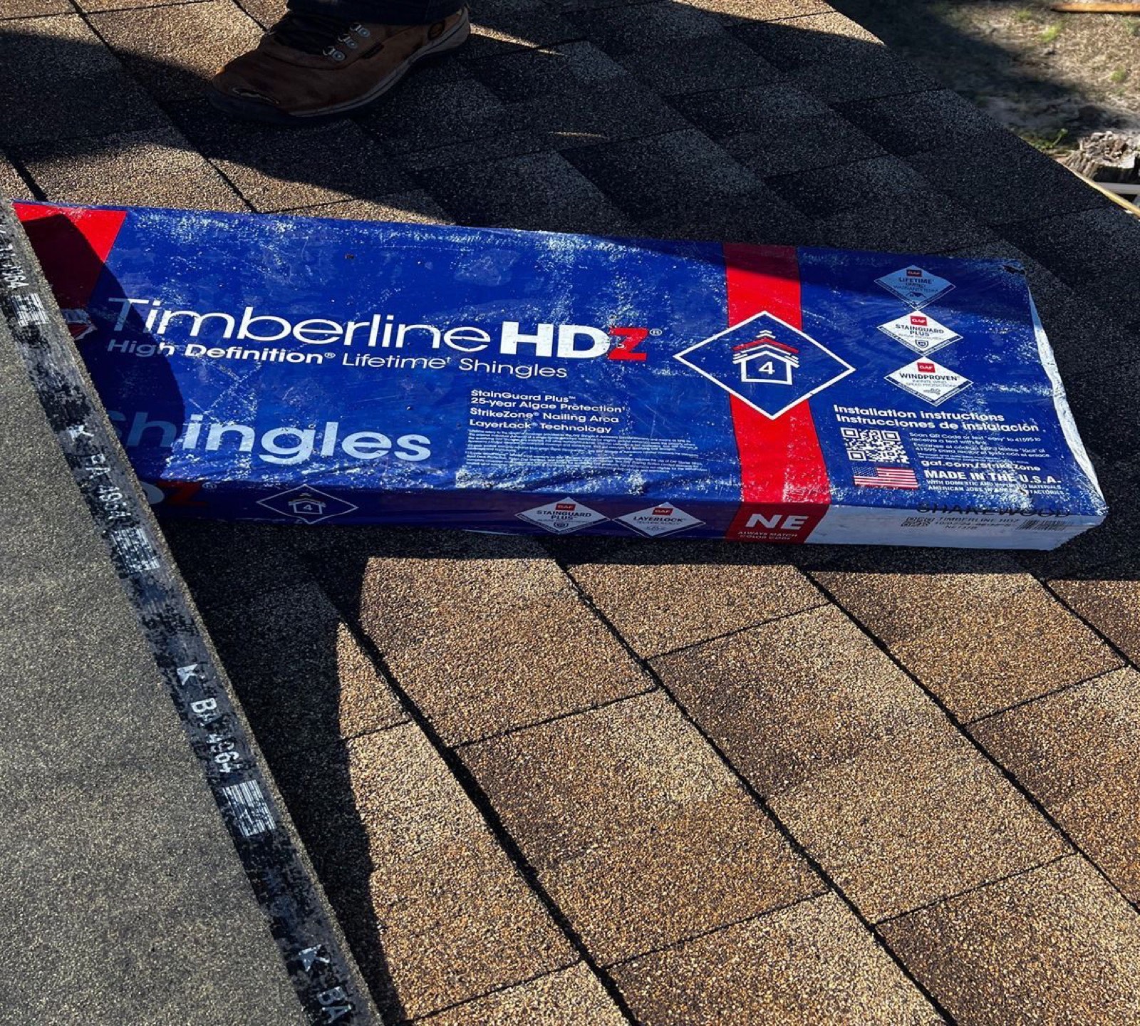 Residential roofing crew at work on a coastal NC home