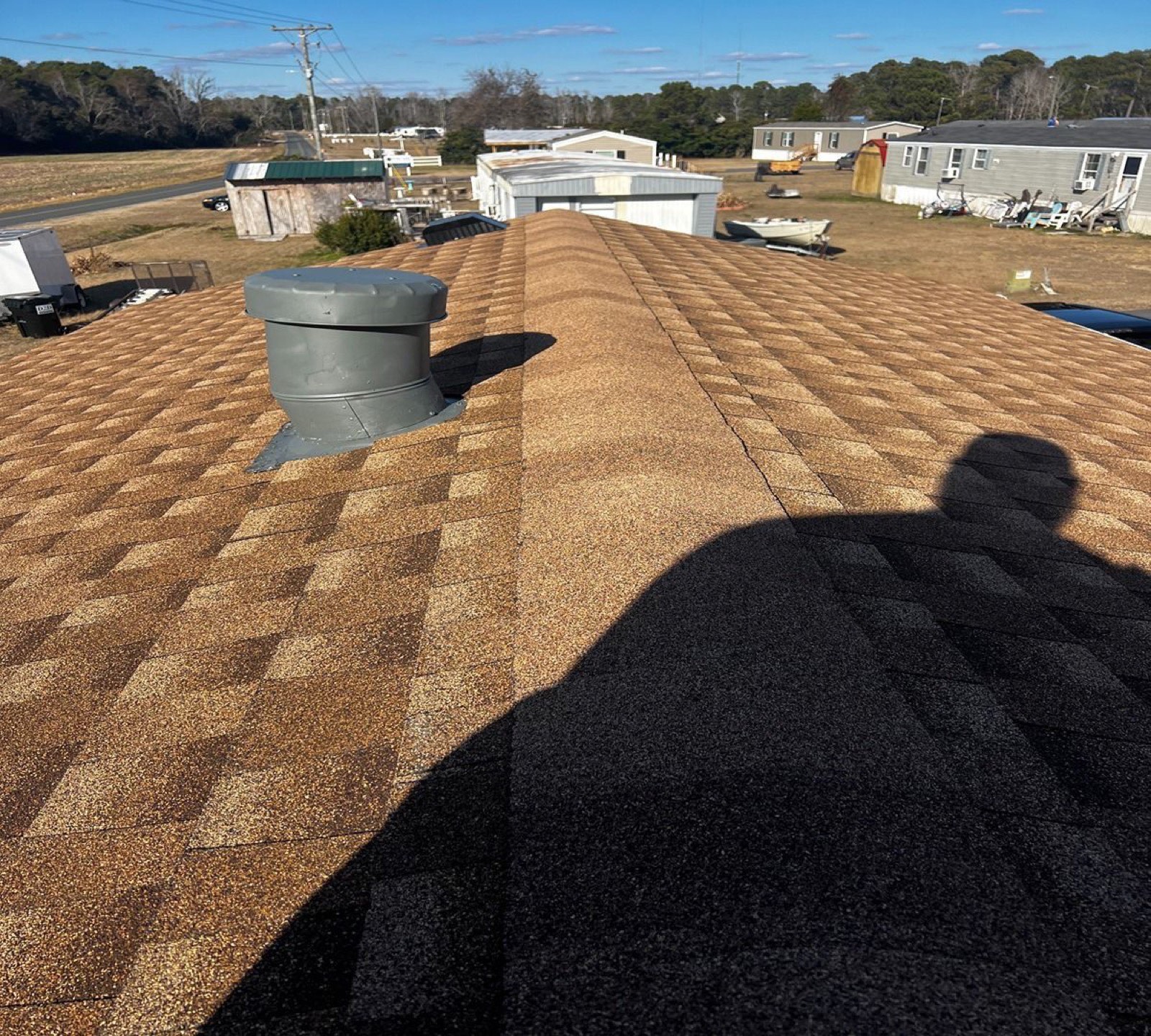 Clean, finished roofline after a Rayze Roofing installation